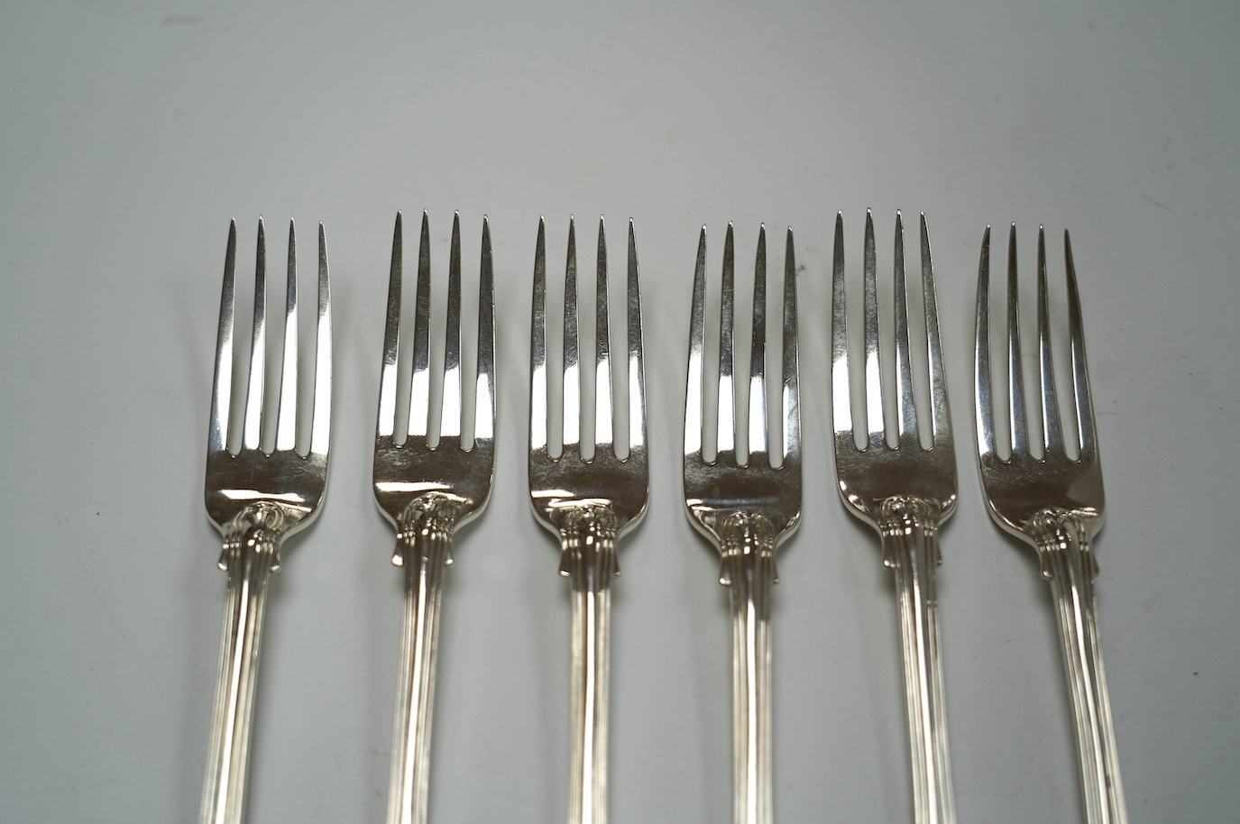 A set of six early Victorian silver fiddle, thread and shell pattern dessert forks, by Mary Chawner, London, 1838, 17.3cm, 12oz. Condition - poor to fair